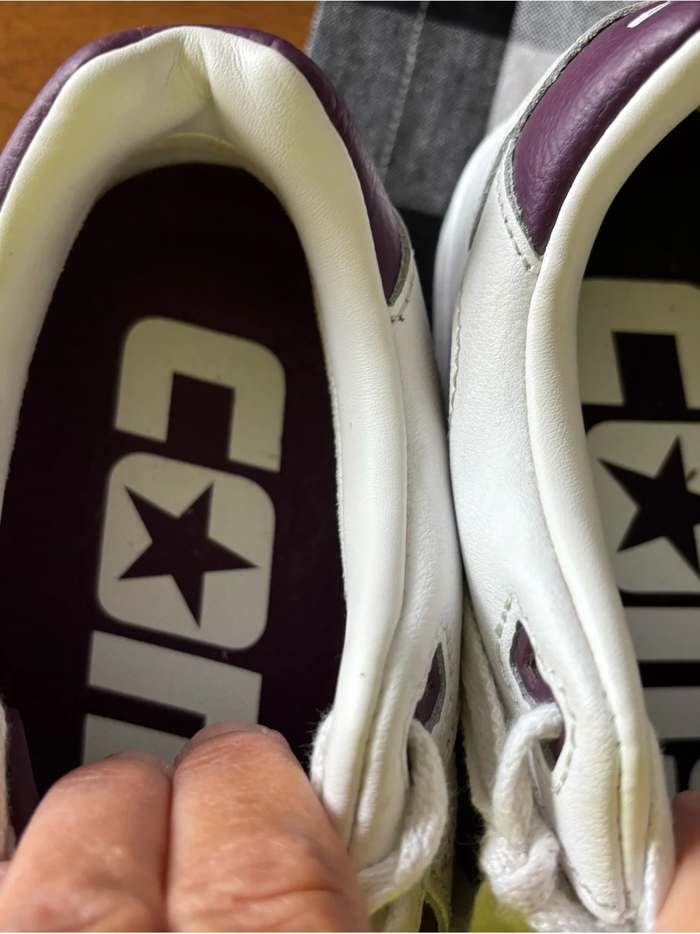 Converse Women’s Low-Top Sneakers in White and purple